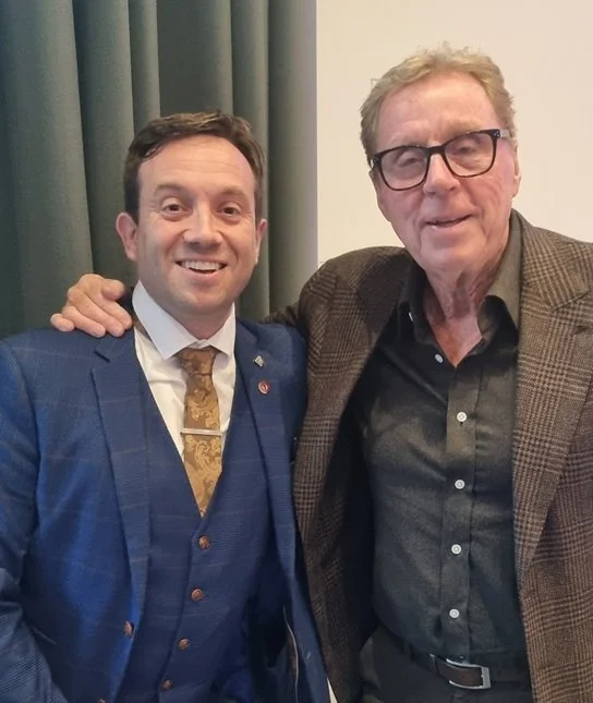 Matthew Garrett with Harry Redknapp after performing magic at a Peterborough United event