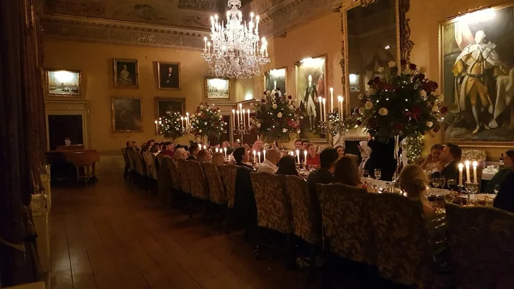 Guests enjoying Matthew Garrett's magic at Brocket Hall