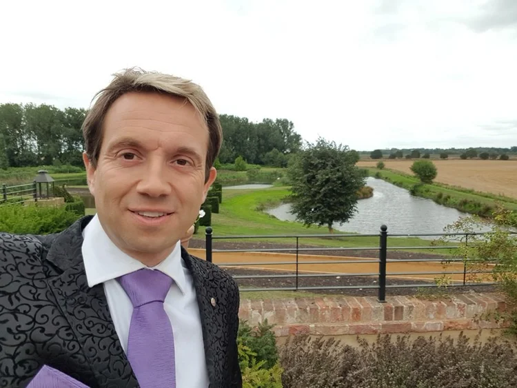 Matthew Garrett performing wedding magic at The Old Hall Ely in Cambridgeshire
