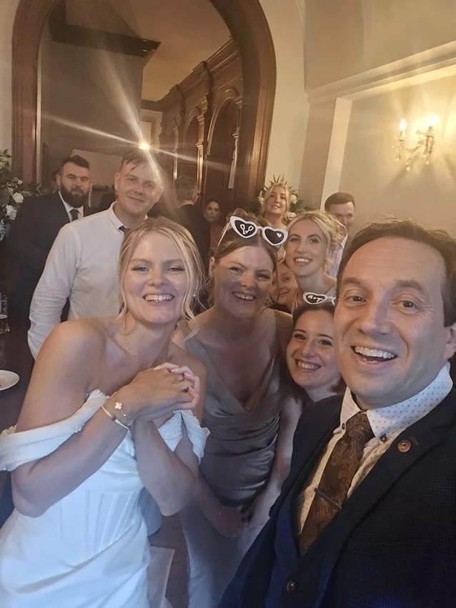 Matthew Garrett performing wedding magic at Bassmead Manor