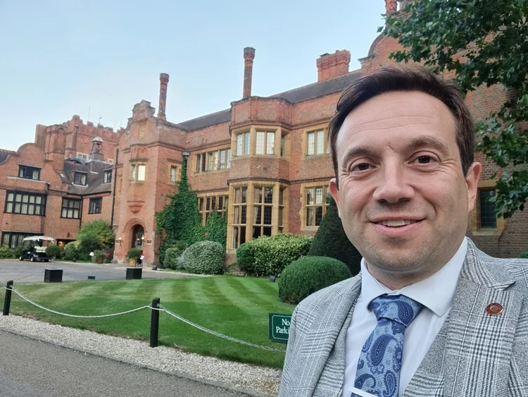 Close-up magician performing at Hanbury Manor in Ware