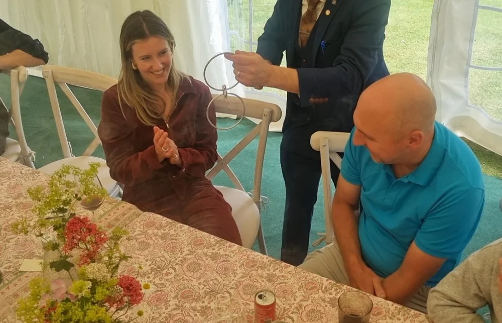 Close-up magic being performed by Matthew Garrett at a Newmarket event