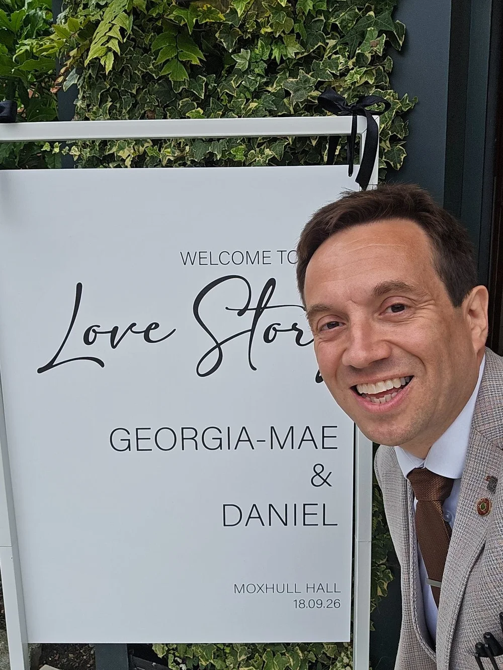 Matthew Garrett with Georgia-Mae and Daniel at their Moxhull Hall wedding