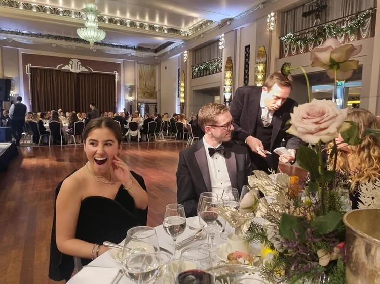 Guests enjoying close-up magic at Sheraton Grand London