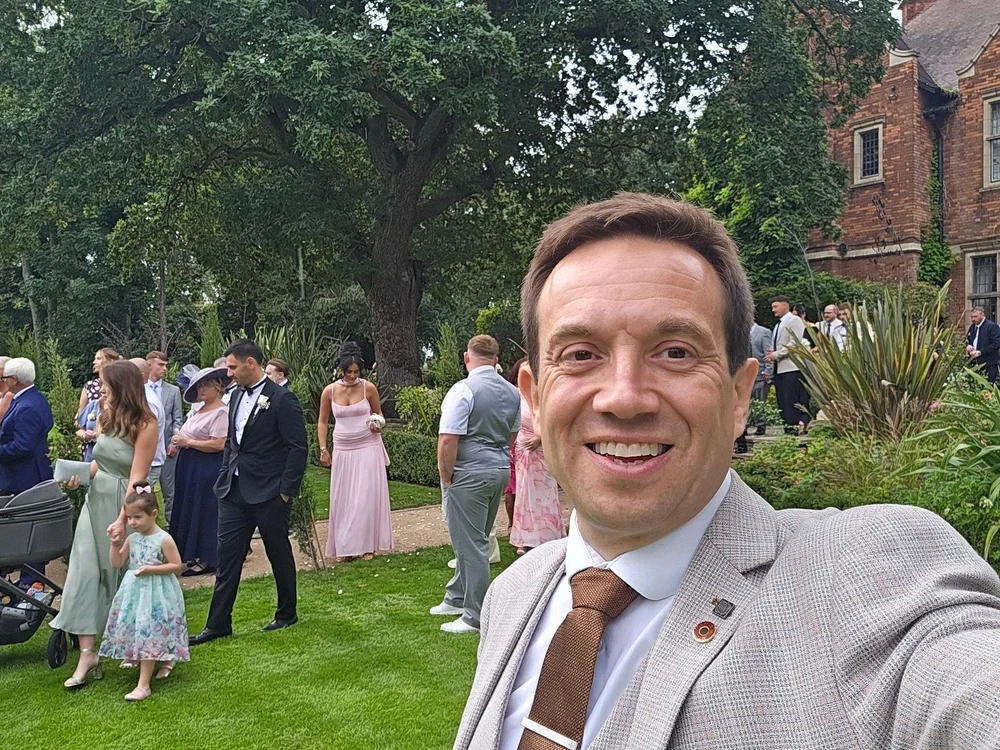 Matthew Garrett entertaining wedding guests at Moxhull Hall