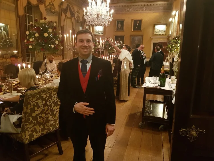 Close-up magic performance at Brocket Hall Hertfordshire