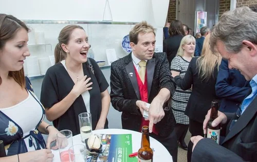 Close-up magic reactions at a London event in Walthamstow