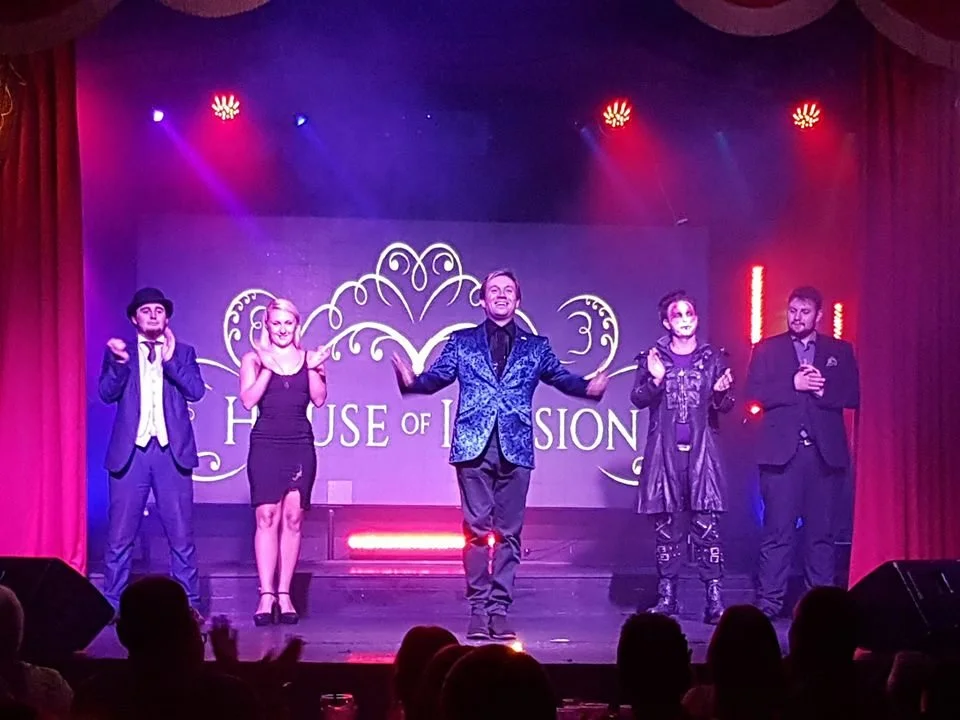 Matthew Garrett performing live family magic at the House of Illusion in Salou, Spain