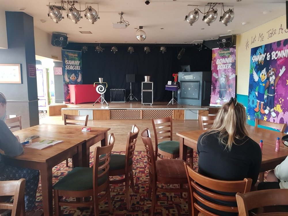 Matthew Garrett performing stage magic at Waldegraves near Colchester