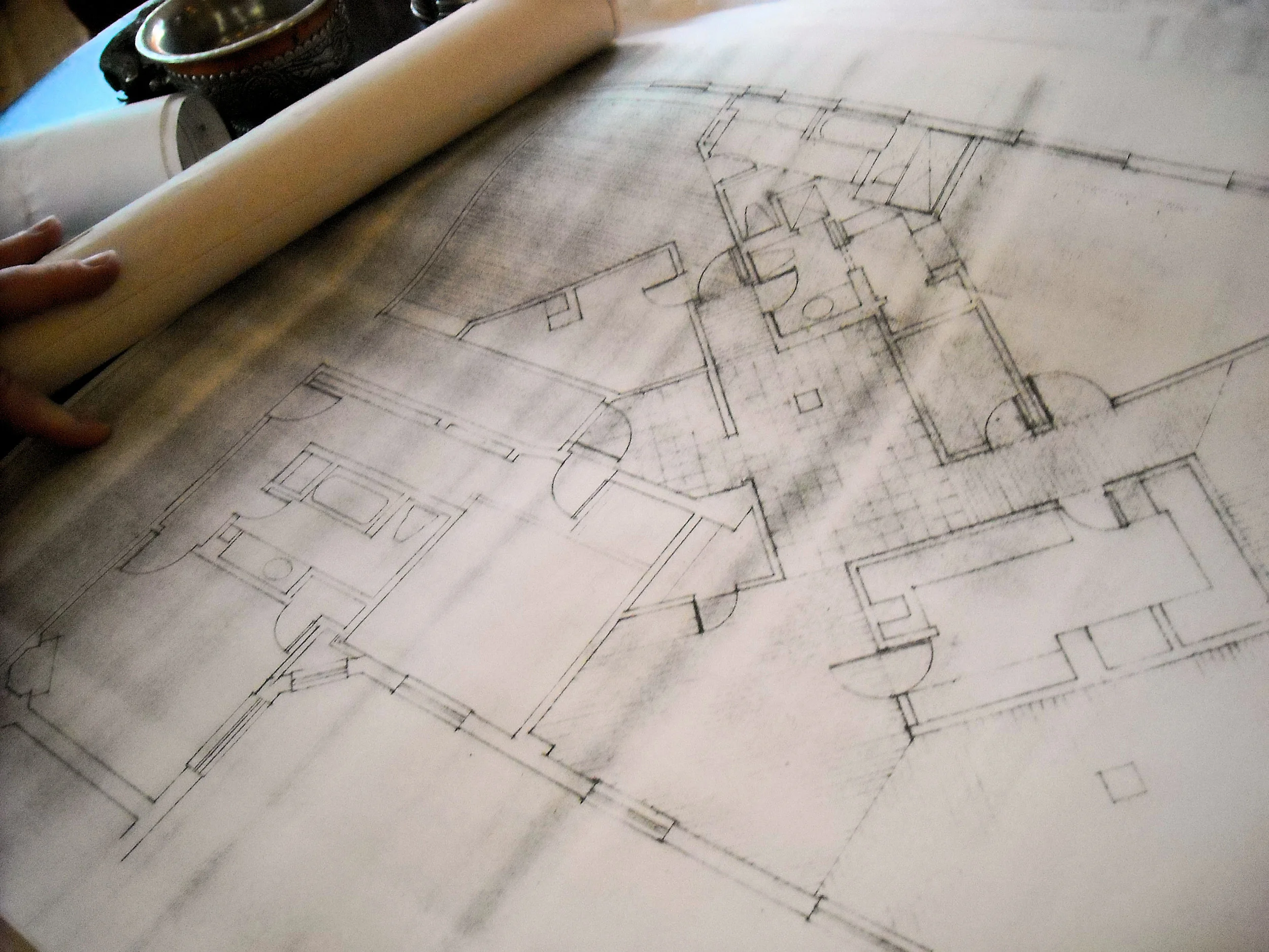 The owner of the Bernstein/Ephron penthouse apartment shows me the blueprints for it.