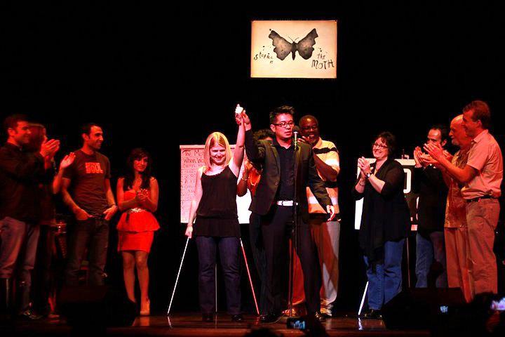 Shrake far left as winner (not Shrake) announced at The Moth GrandSlam Detroit (1st one) at Gem Theater, Detroit, MI