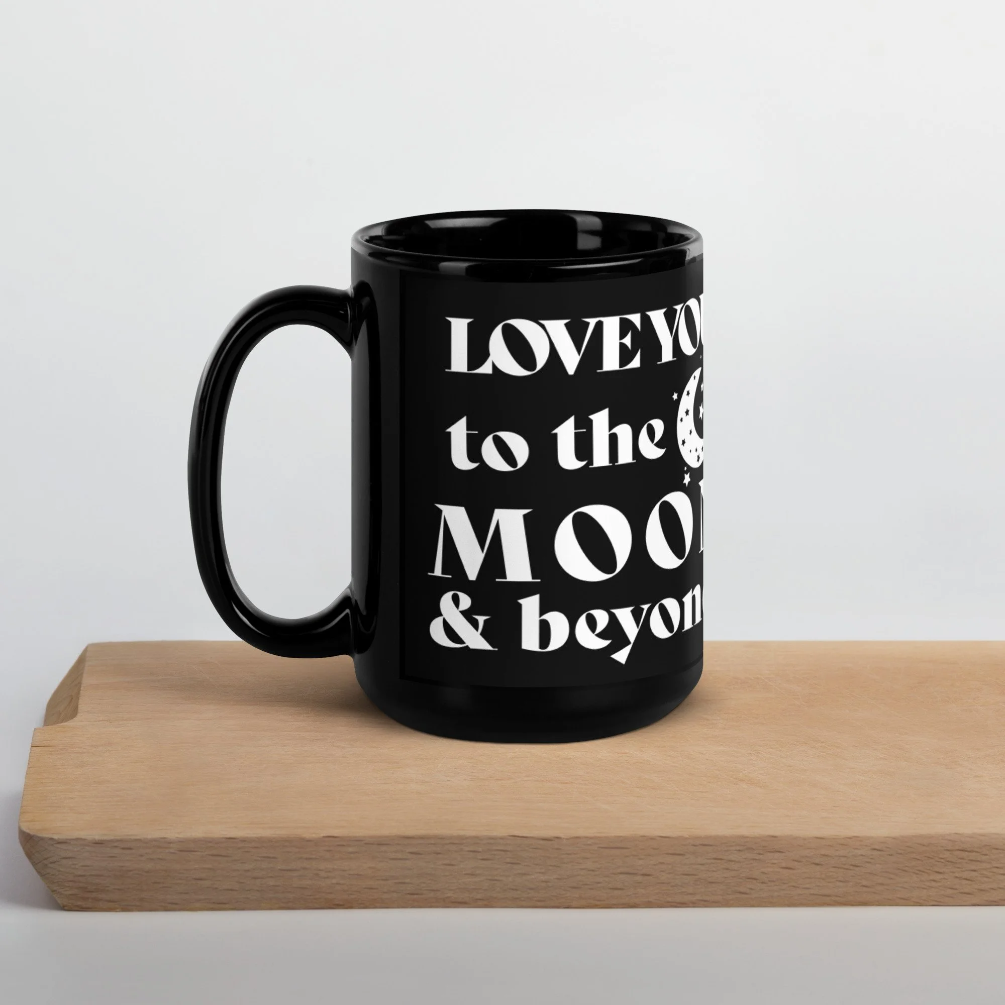 black-glossy-mug-black-15oz-handle-on-left-637c47f5b6960.jpg