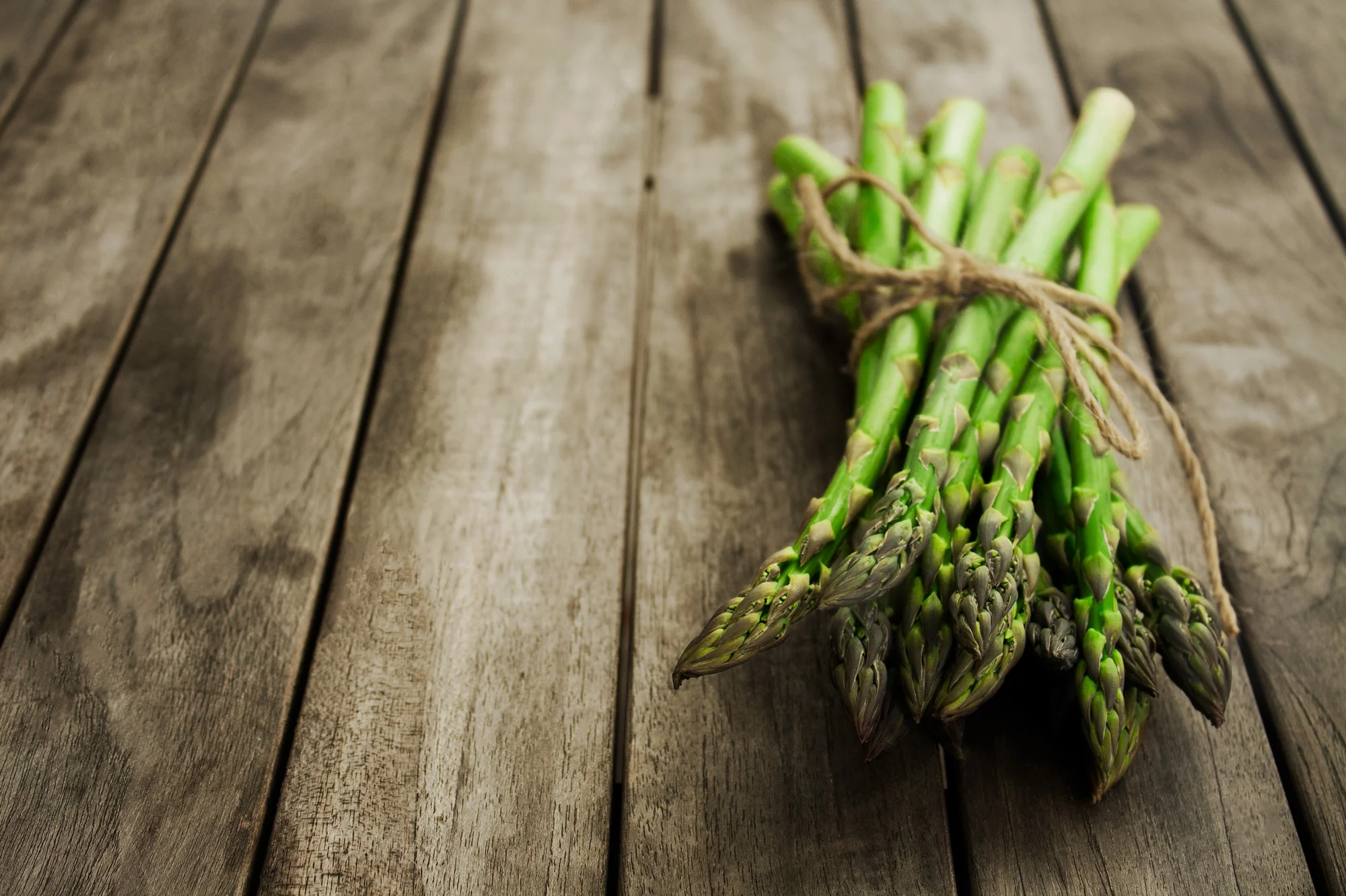 Asparagus-bunched-on-wood.jpg