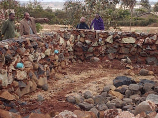  Mlimani classroom, Aug 2012 Inspecting the foundation. 