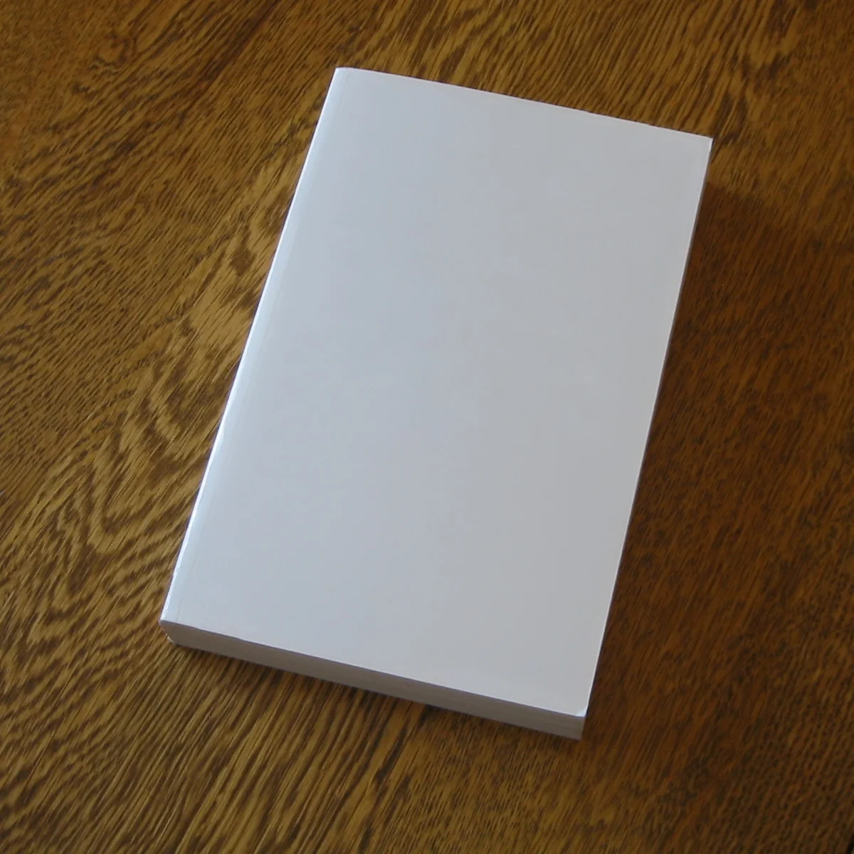 Blank_book_on_a_table.jpg