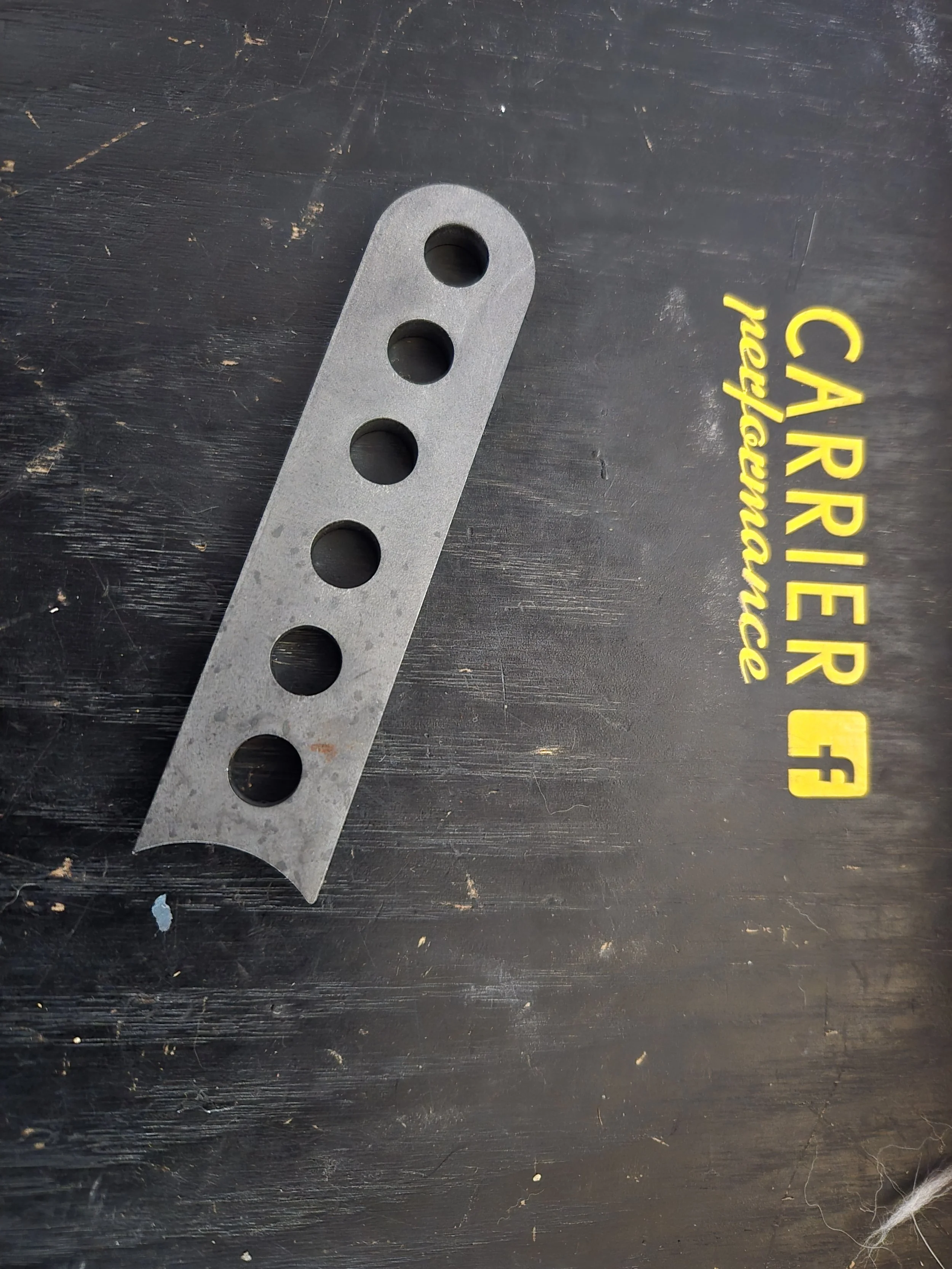 Steering column tie rod arm