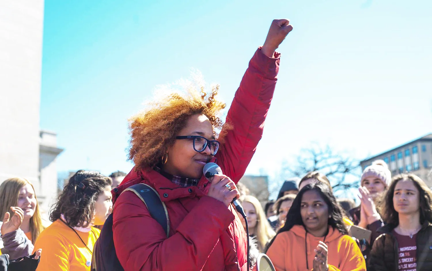 Ali speaking at the youth-led school walkout in 2017, where several thousand students from all over Wisconsin marched from Madison East High School to the Madison Capitol demanding gun control. Photo by Leslie Amsterdam.