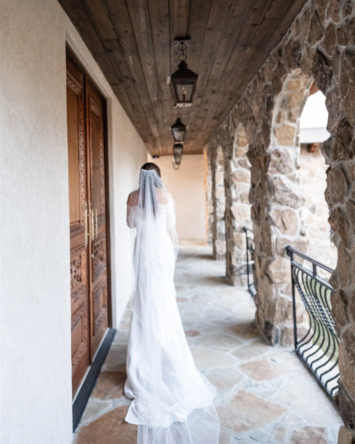 I love to watch for those "in between" moments with a bride. The moment they are walking to their ceremony, or making sure their veil falls just right, or waiting for their dad to see them for the first time. The emotion is there in every s