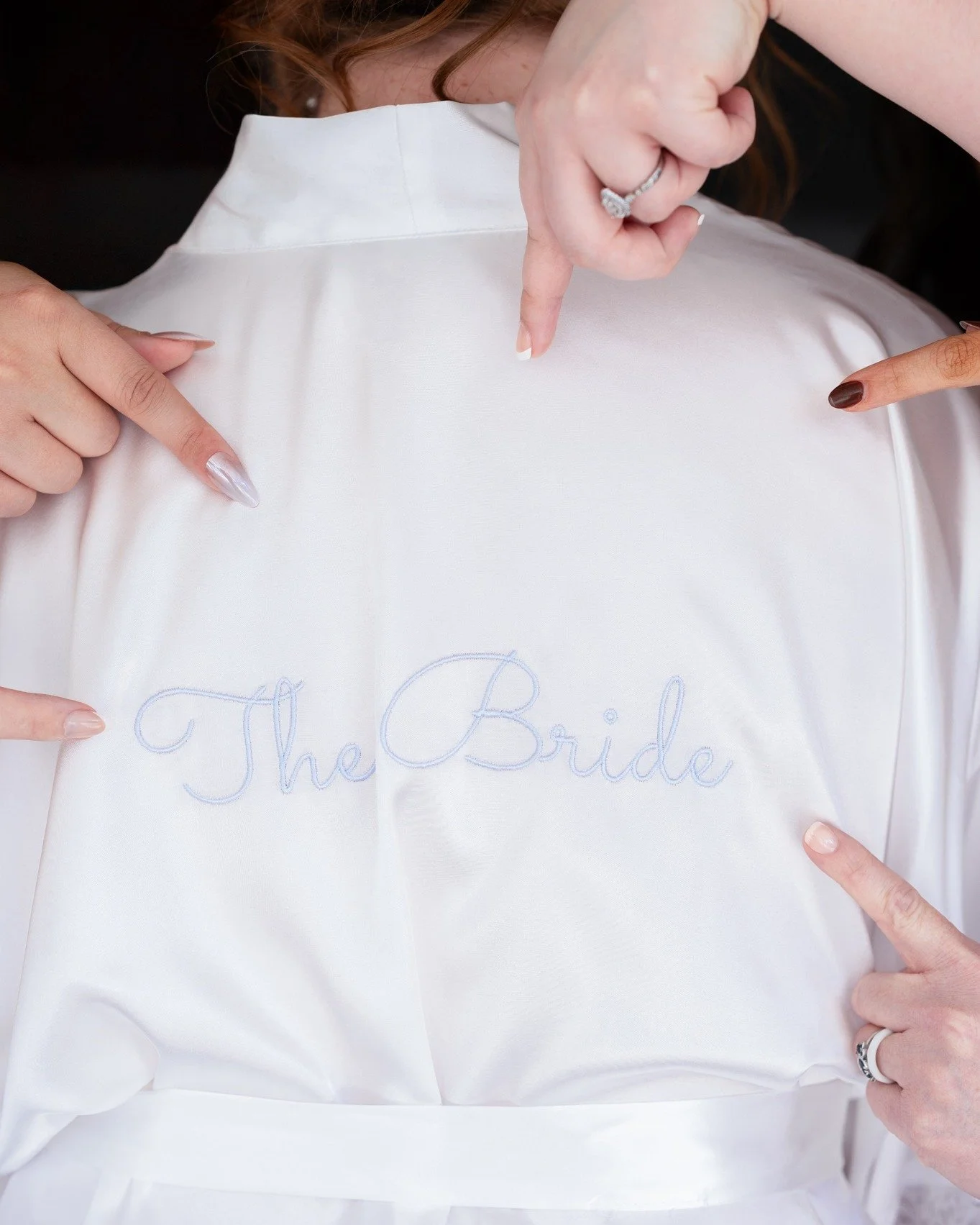 Matching robes or champagne glasses make for fun, beautiful getting-ready photos. What&rsquo;s your bridal party vibe: cozy robes or glam champagne?