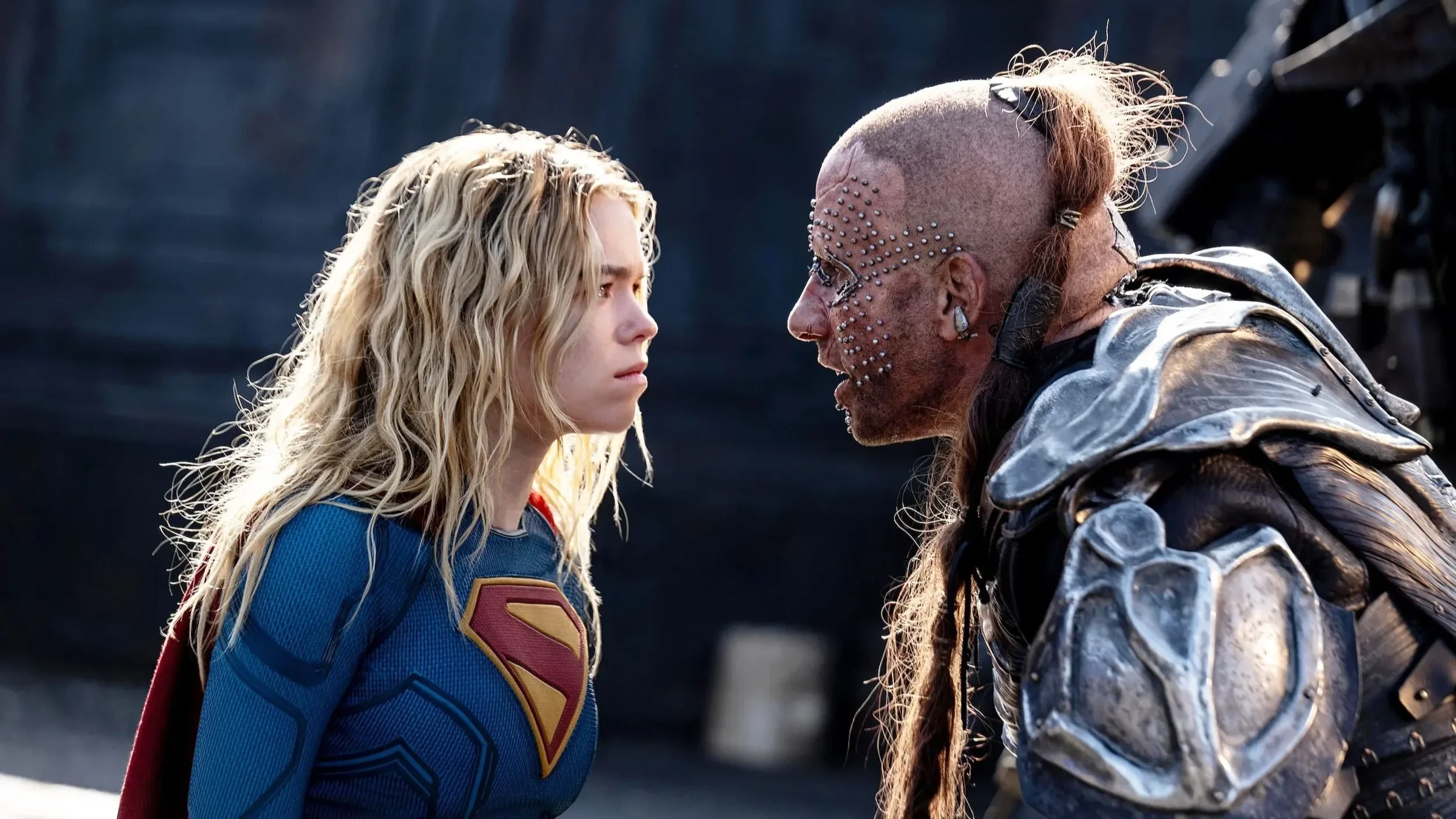 Supergirl (Milly Alcock) is locked in a stare-off with intergalactic villain, Krem (played by Matthias Schoenaerts).