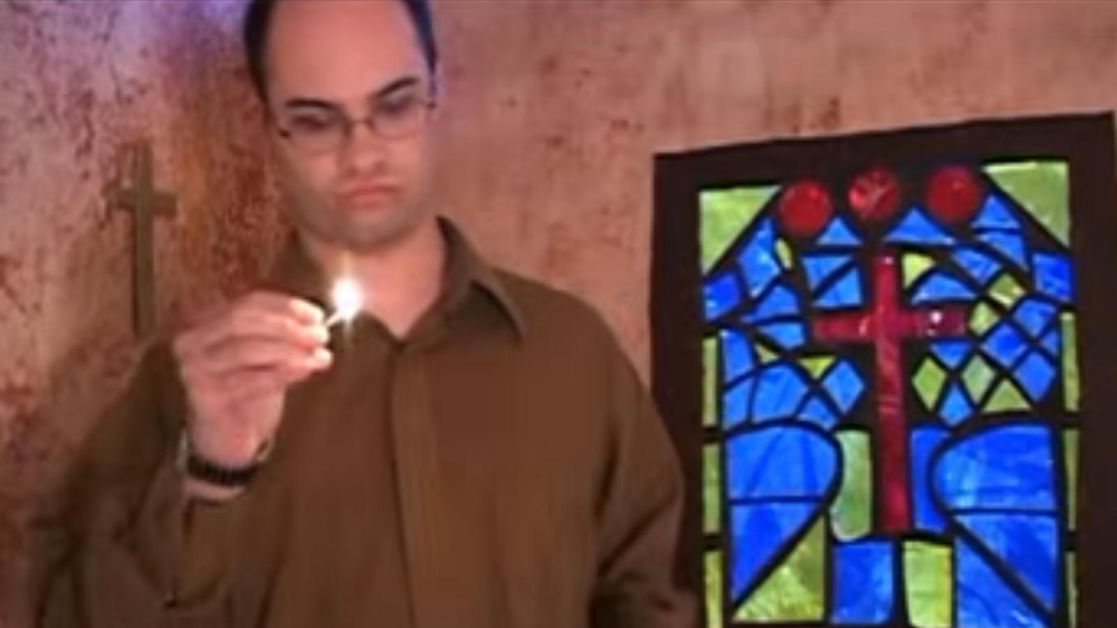 Arthur lights up a match in a church in the movie Ben and Arthur.