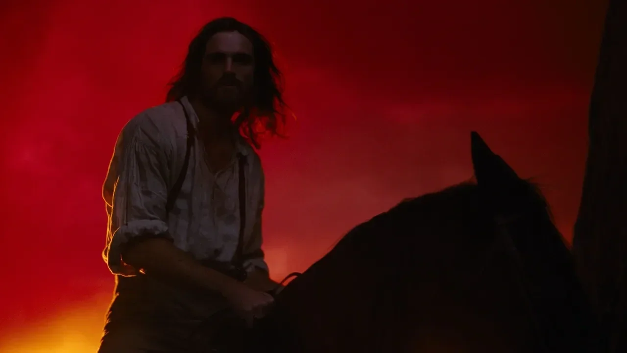 Jacob Elordi as Heathcliff on top of a horse in "Wuthering Heights."