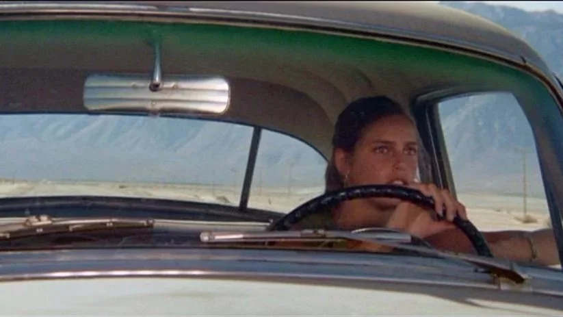 Daria Halprin as Daria drives in the film Zabriskie Point.