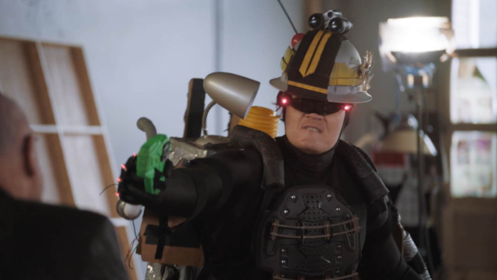 Skweezy (Tim Savage) wears a handmade Robocop-type costume in the film Skweezy Jibbs Makes a Movie.