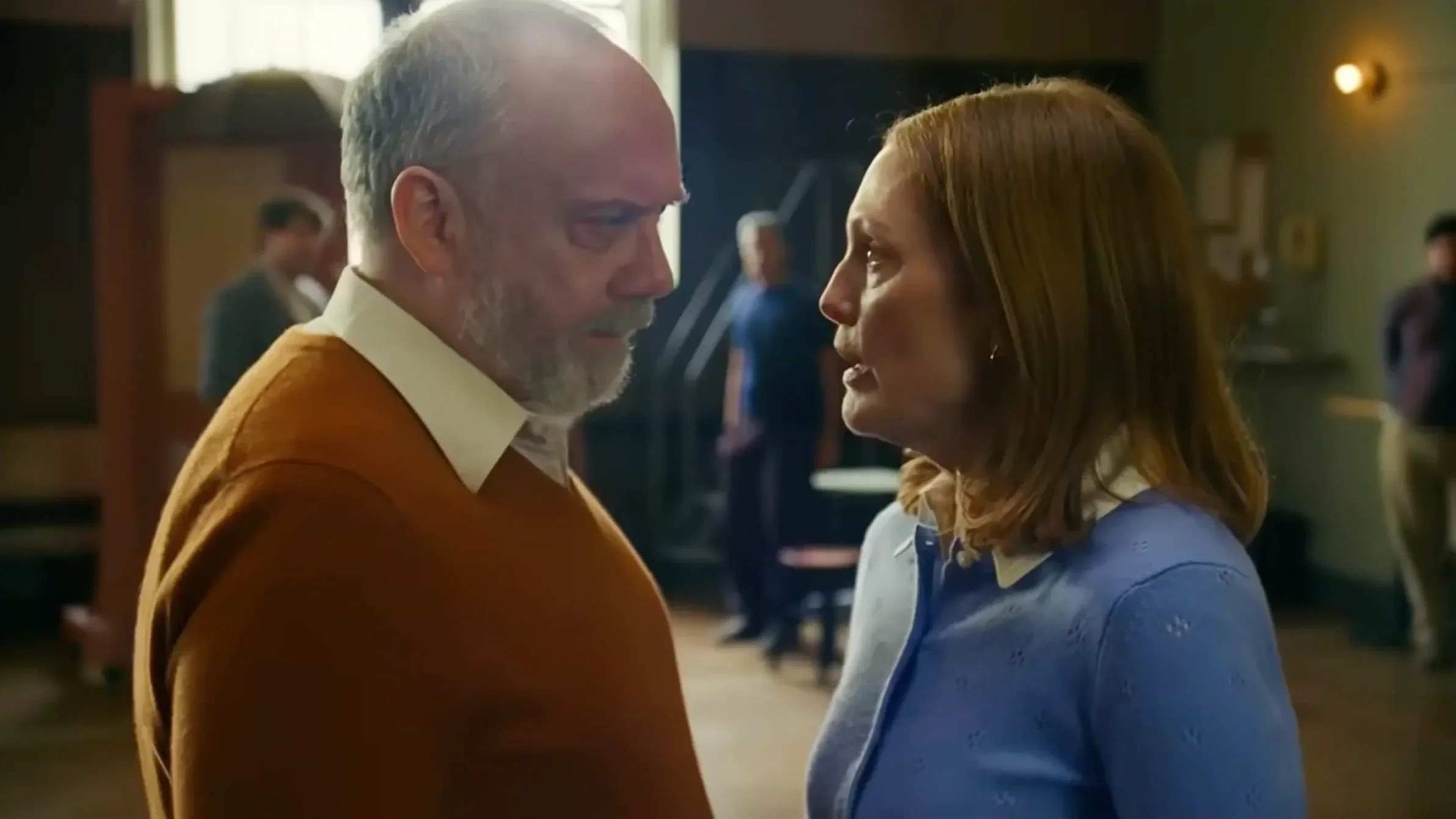 Paul Giamatti and Julianne Moore look at each other in the film The Debut.