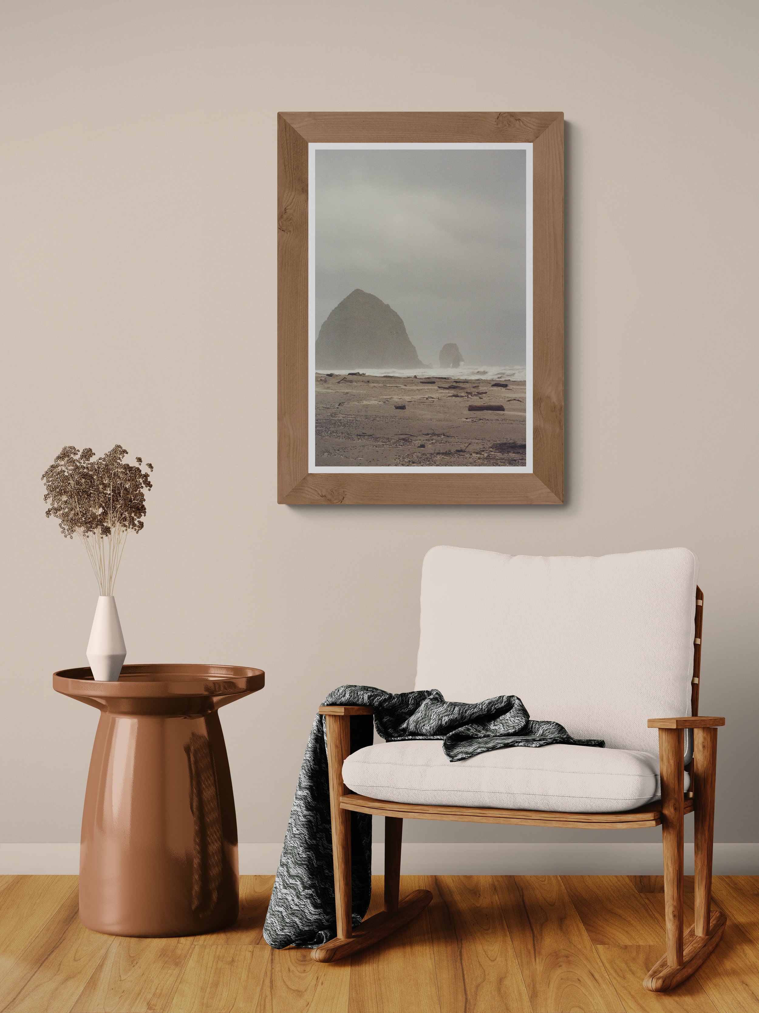 Haystack Rock Cannon Beach matte fine art print framed in light wood on a neutral wall, Britt Vasina Studio