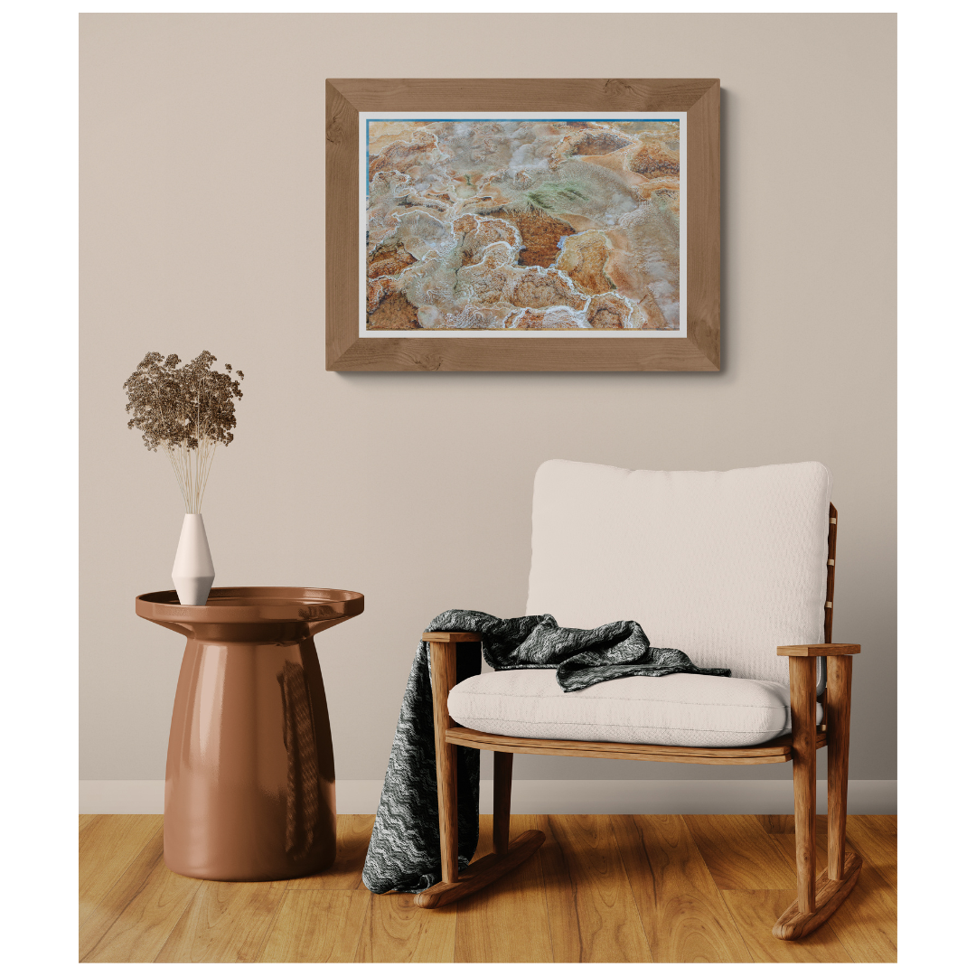 Yellowstone Thermal Veins fine art print, framed and matted, styled in a room next to a chair, Britt Vasina Studio