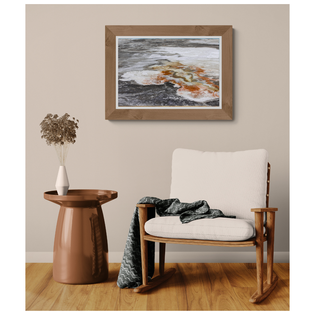 Yellowstone Mineral Drift fine art print, framed and matted, styled in a room next to a chair, Britt Vasina Studio
