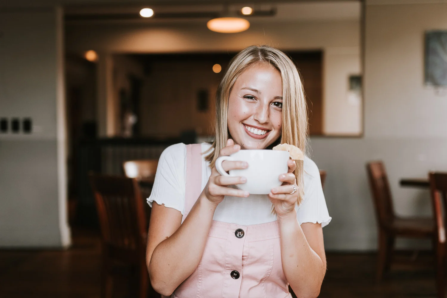 We cannot say enough about how much we loved having Brigette to my daughter's (Claudia) Senior pictures! She took the time to find out a little about Claudia so she could recommend where we would do pictures. Claudia loves coffee and one of the places we went to was Frothy Monkey - pics with her big mug were adorable! Claudia is not super comfortable posing but Brigette made it feel so natural and we had so much fun! She is literally the sweetest woman - she had so many great ideas for great spots to shoot. We absolutely LOVE LOVE LOVE the pictures! She really captured my daughters happiness and sweet personality. I want to do family pictures with her soon. Thank you so much Brigette!!!! - Karen