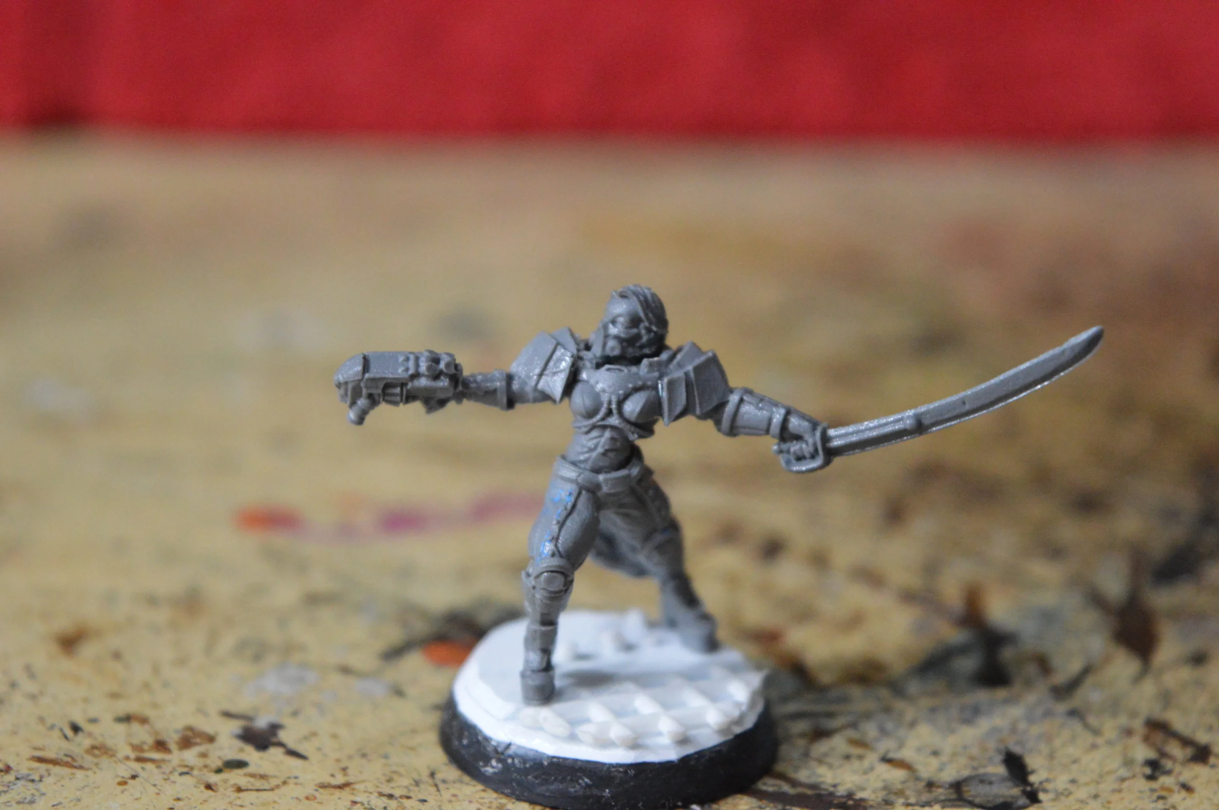 You can see the blue paint on her right thigh. 