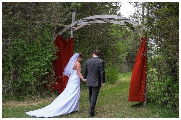 This dramatic archway created from re-purposed church rafters sets the scene for a picture-perfect outdoor wedding ( Small Pond Arts , Picton, ON).