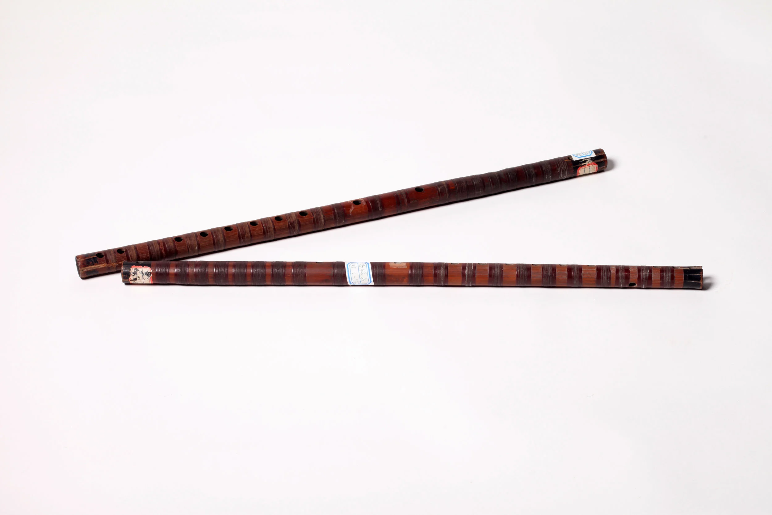 Qudi (Sudifor) serves as the lead instrument for accompanying in kunqu opera, which can be subdivided into female flute ( cidi ) and male flute ( xiongdi ). The female flute is usually played with xiaogongdiao (a pitch collection with its gong —fundamental—tone corresponding to the tone produced by the xiaogong fingering on the kunqu flute for sheng (the main male roles) and dan (female roles). The male flute is a bit thicker, a half-tone lower than the range of the female one, and is played for jing (the painted face male roles) and mo (mid-and old-aged male roles). Both flutes combined can realize modulation by rolling the gong note .