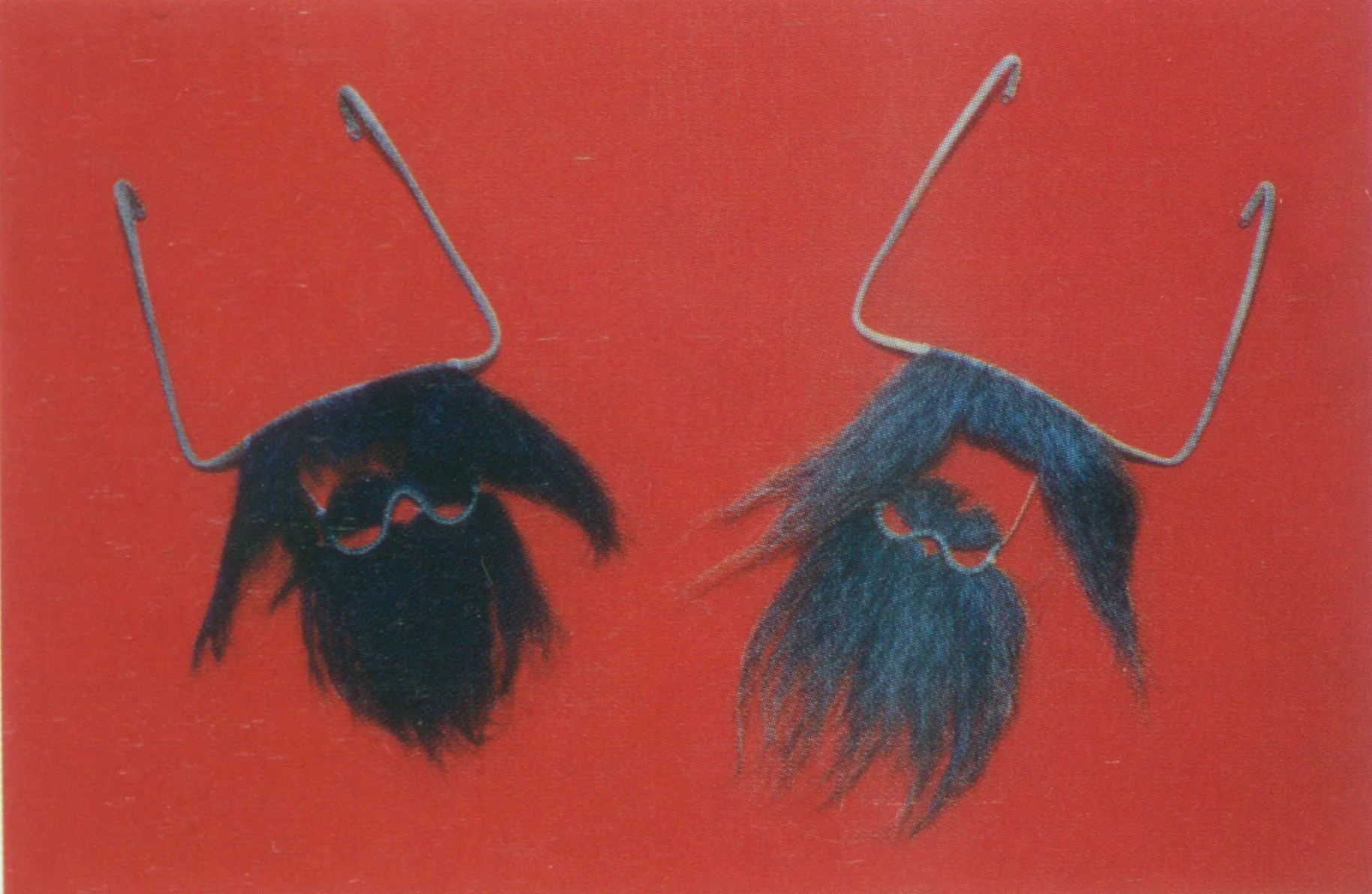 Diaoda a type of rankou also called as “baize diaoda” handlebar moustache upon the upper lips with a strand of beard in the chin. This is a perfect fit for humorous characters, such as Wan Jiacun from The Joys of the Fishing Folks, Zhuge An from Pavilion of the Colored Clouds ; Diaoda is also used by misbehaved Fu and Chou roles, such as Tang Qin from A Handful of Snow and the local constable in Fifteen Strings of Cash. 