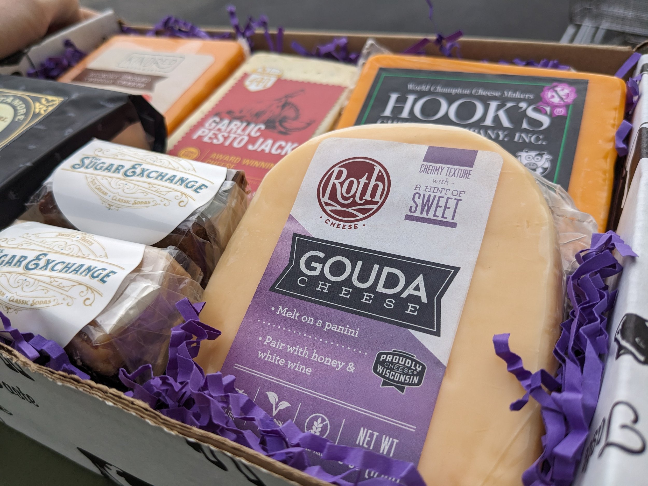 2023 THE WI SAMPLER CHEESE BOX GOUDA CLOSEUP.jpg