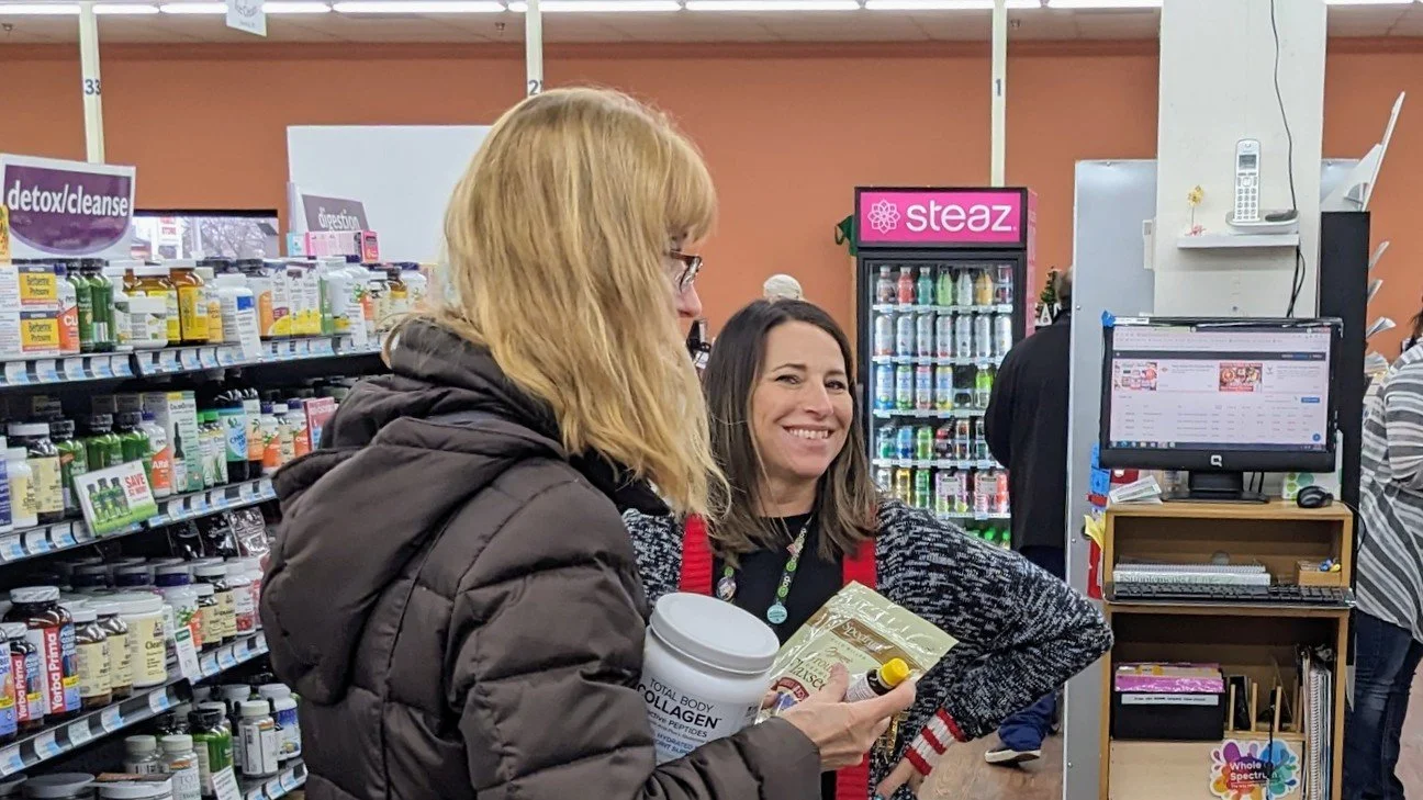 Rhonda with customer Dec 23 Super Tuesday.jpg