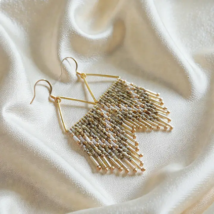 Screenshot 2026-09-22 at 12-57-06 Millie - Triangle Fringe Earrings - Faire.png