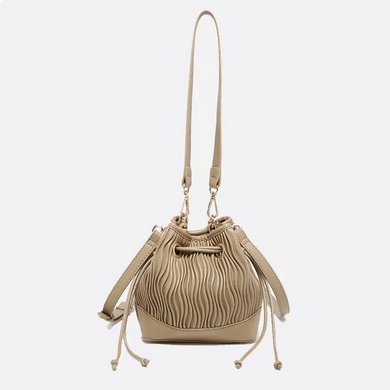 Screenshot 2026-04-02 at 14-49-56 (21) JN2698 Aruba Textured Bucket Bag w_ Crossbody Strap - Faire.png
