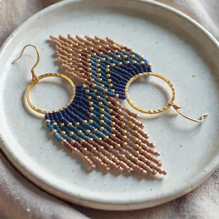 Screenshot 2026-09-22 at 14-21-27 Montana 2 - Ombre Fringe Hoop Earrings Handwoven Jewelry - Faire.png