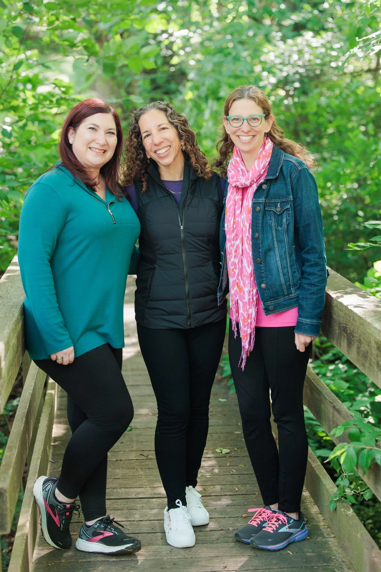 group of outdoor therapists smiling at the camera in spring time in Maryland.