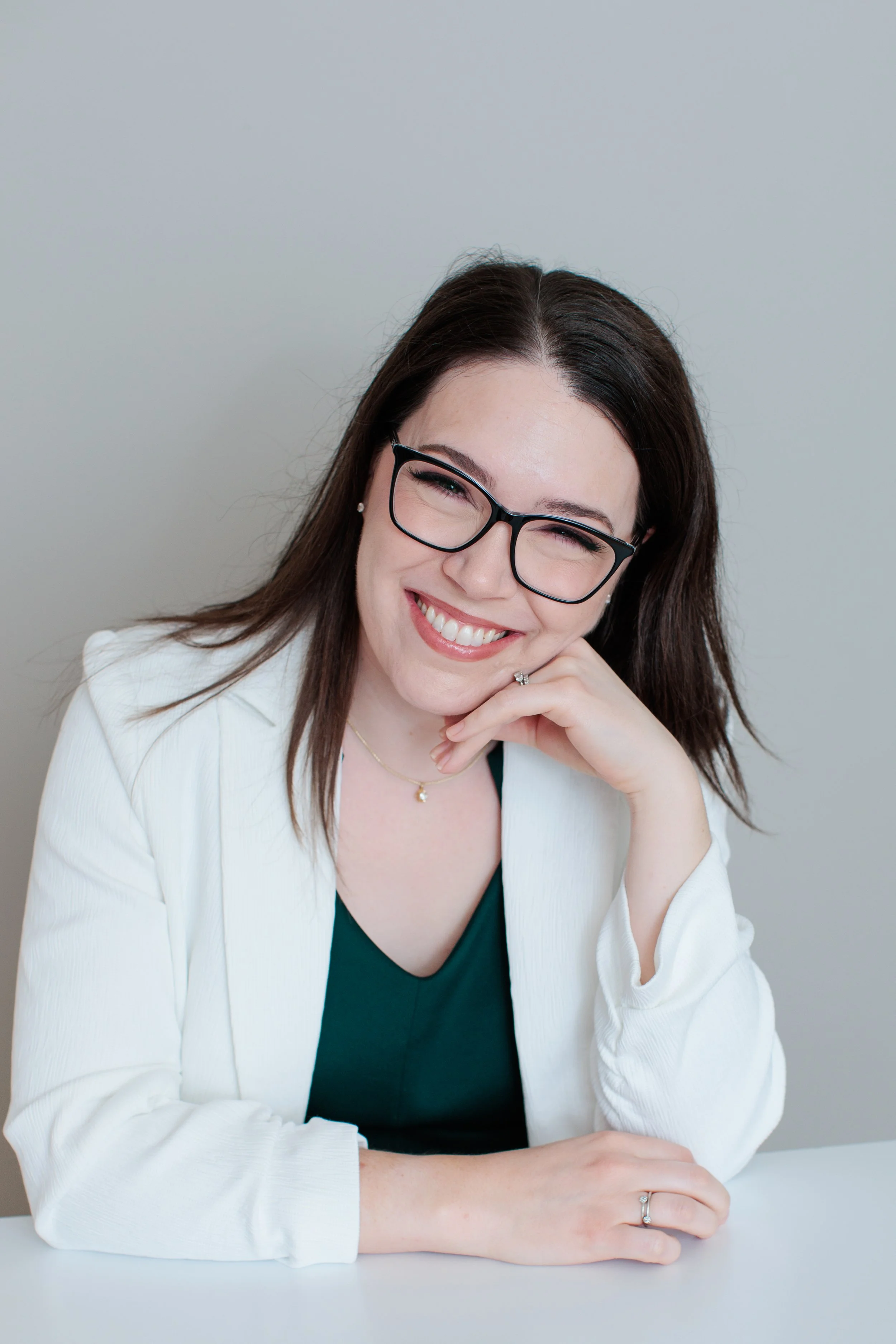 woman smiling at camera for headshot photo