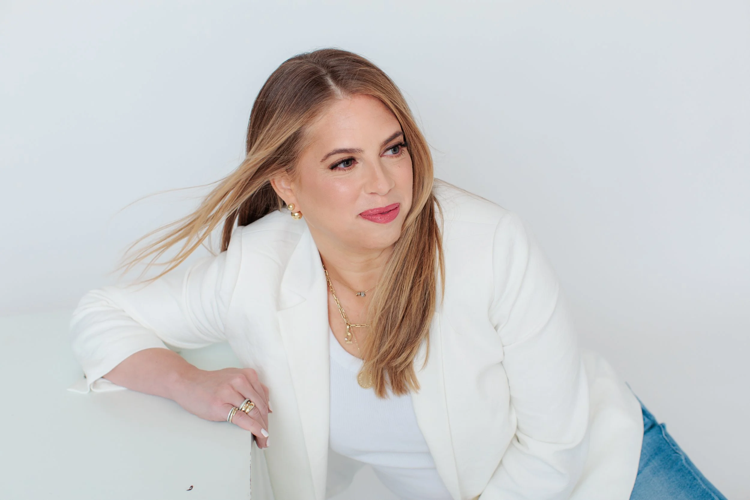photo of woman in white blazer in Silver Spring studio