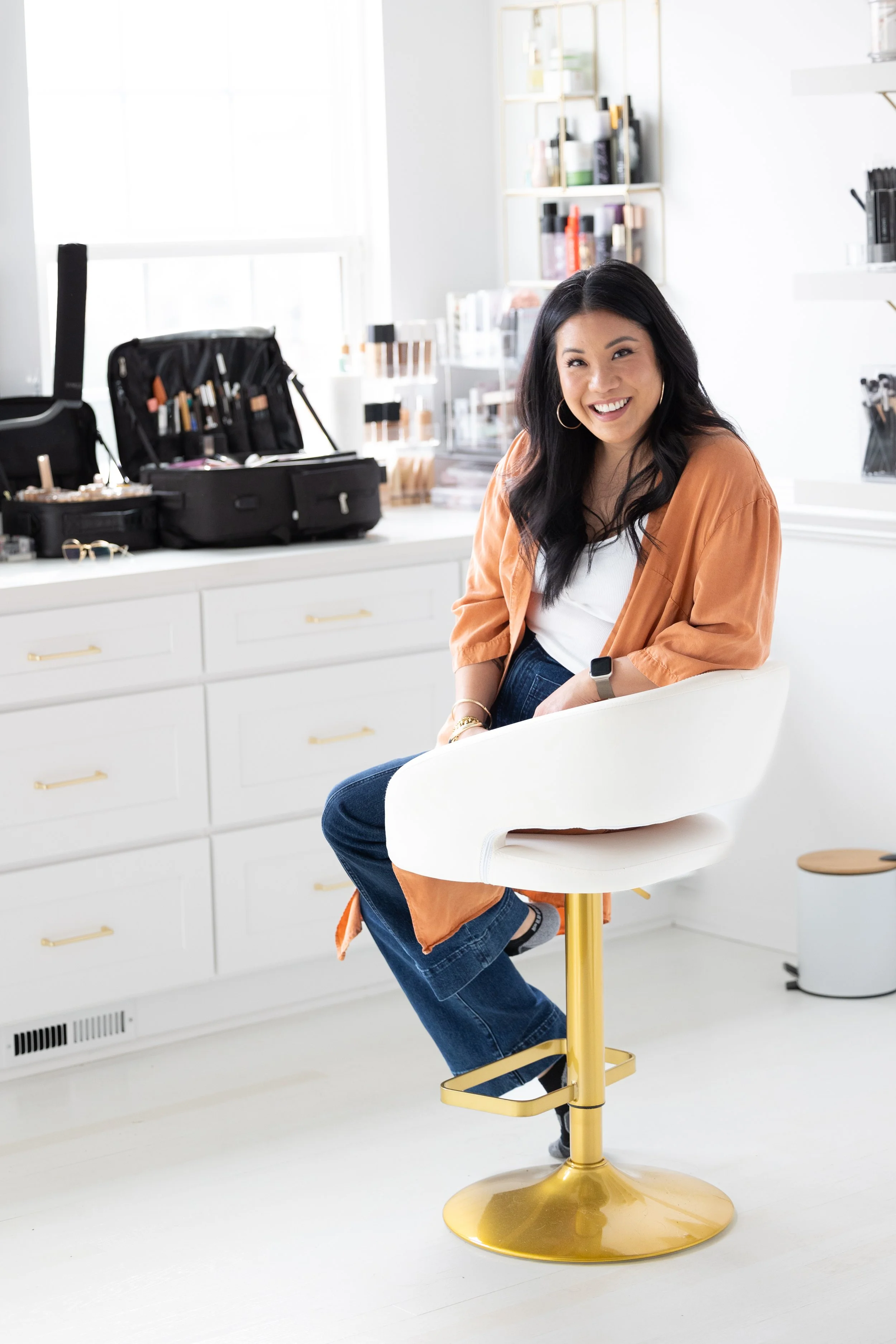 Asian makeup artist in her home makeup studio
