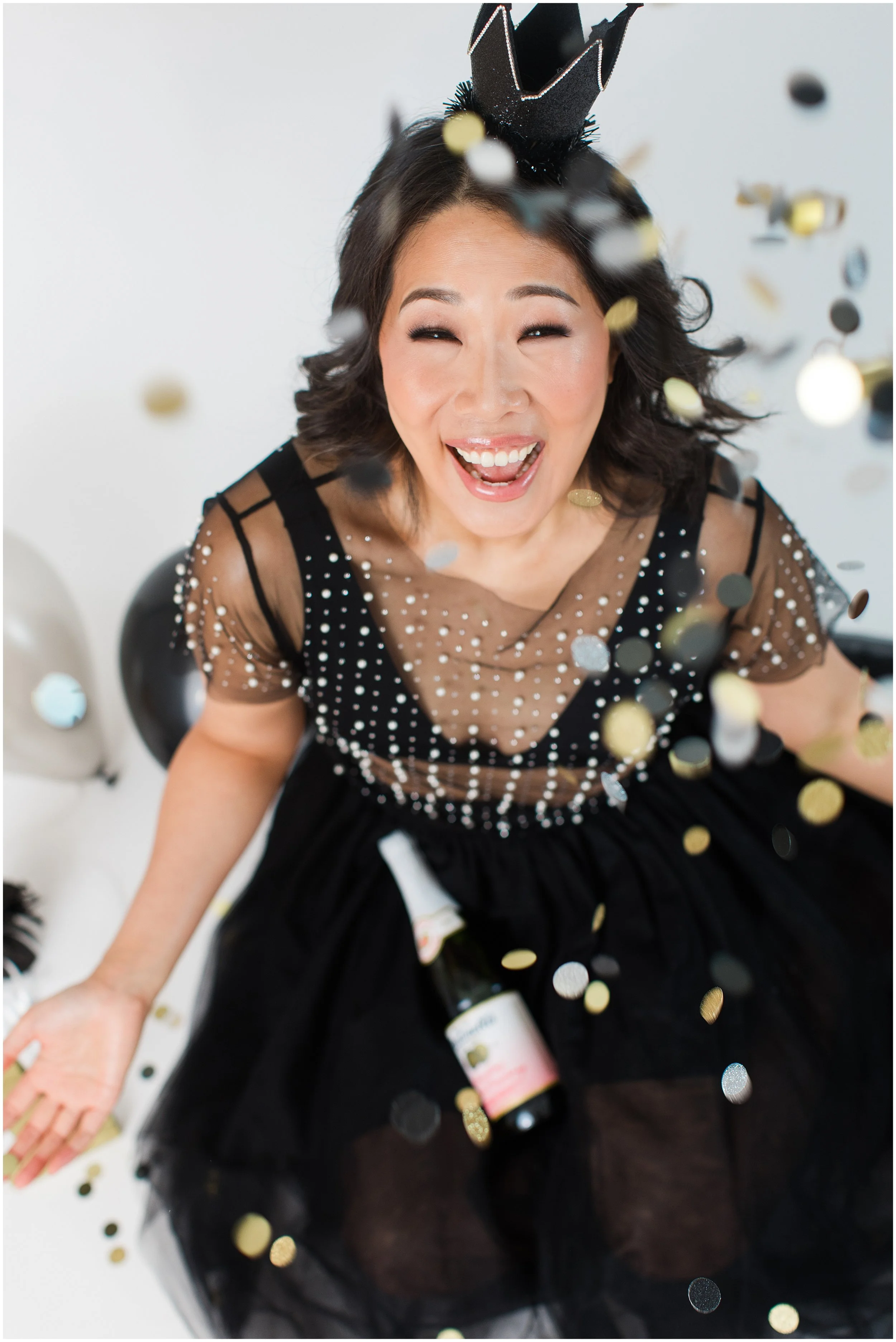 woman throwing confetti to celebrate in Silver Spring studio maryland