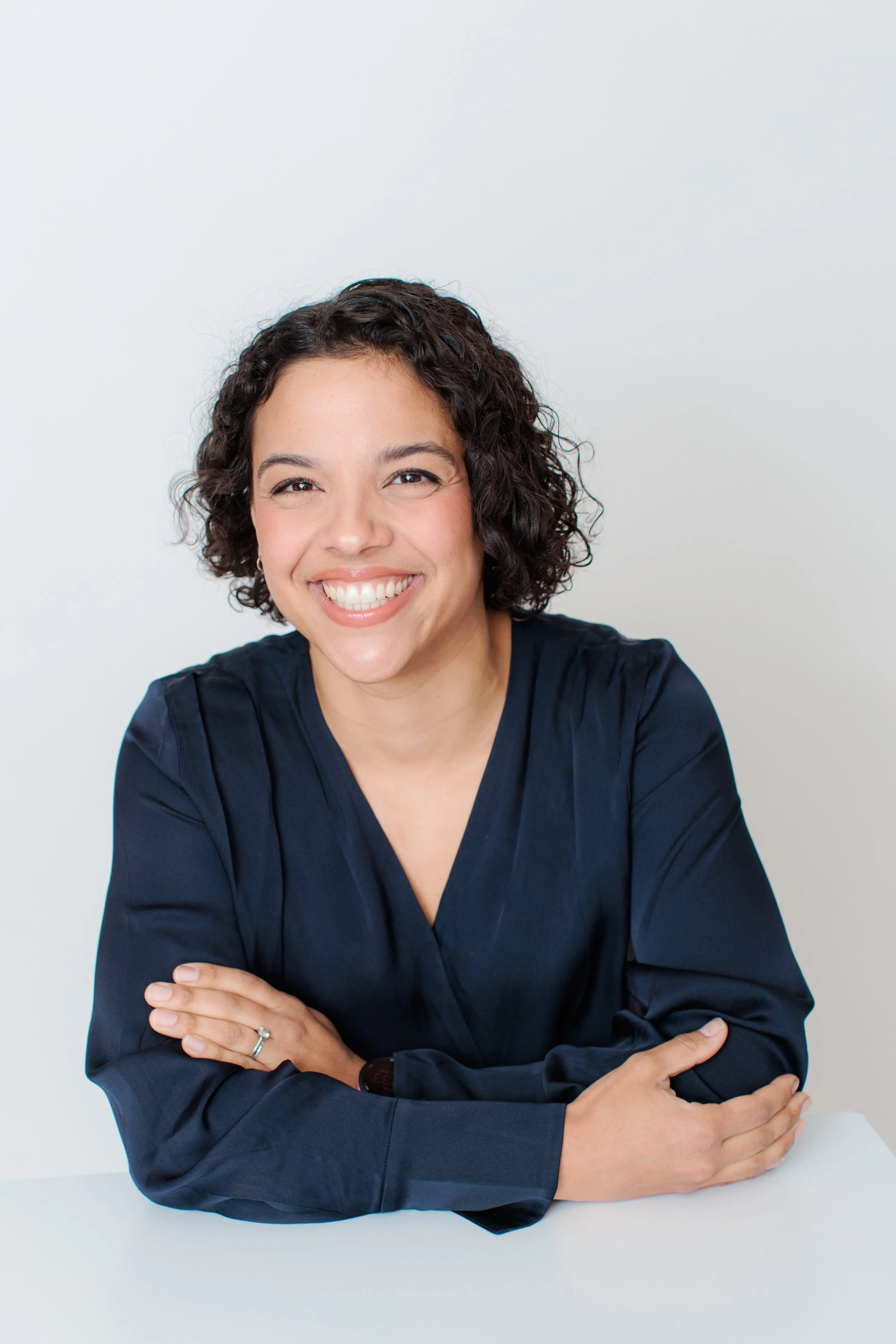 female laughing and having fun at studio headshot session