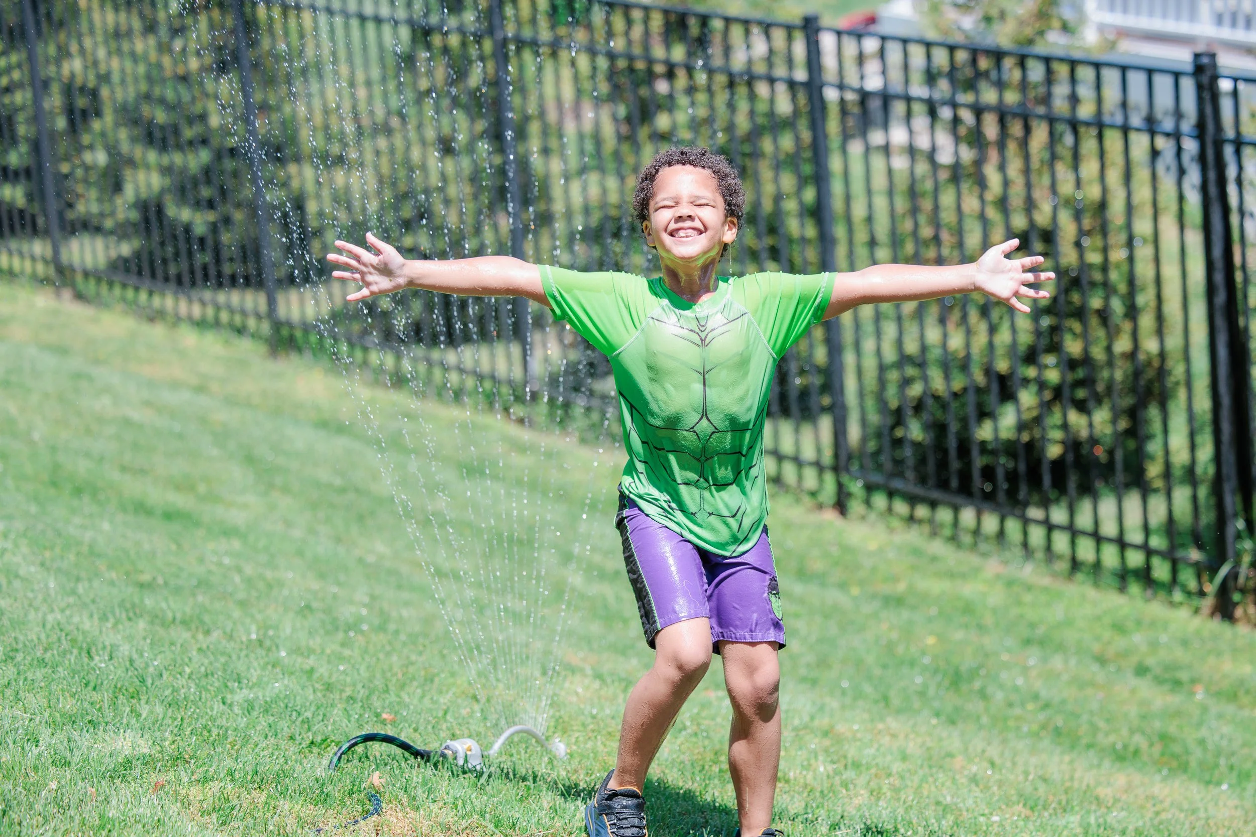 A perfect sprinkler day! Love the pure joy and smiles and fun! 💧🌞