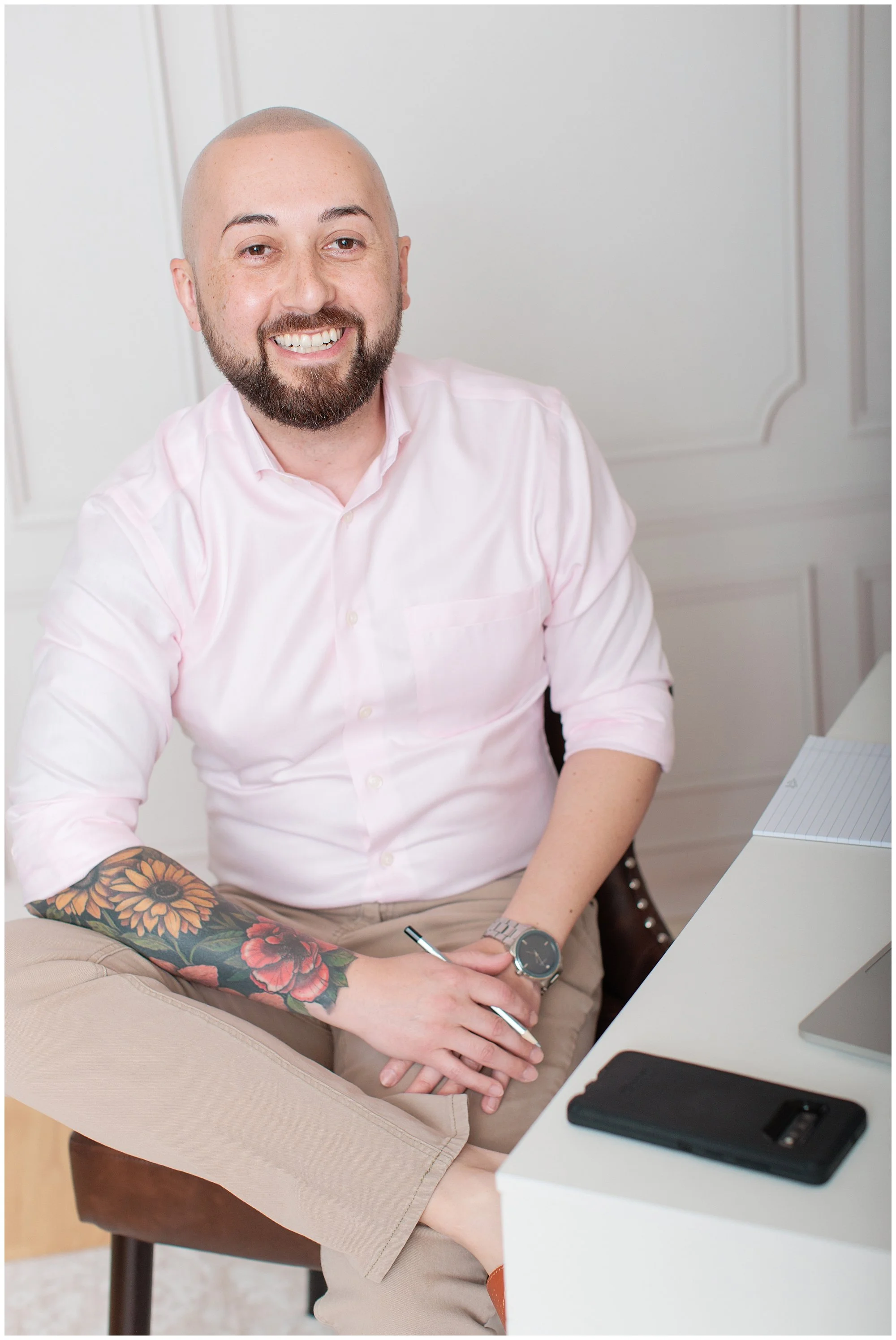  business man in pink shirt smiling at camera in Silver Spring Studio 